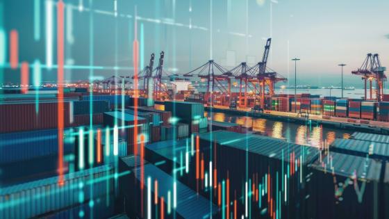 Chart against a background of shipping containers in a port